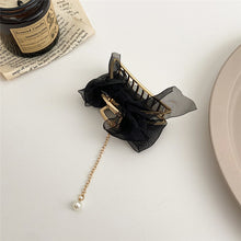 Presilhas elegantes de metal para cabelo